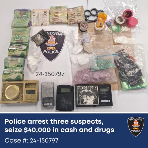 Display of seized drugs, weapons, and cash.
